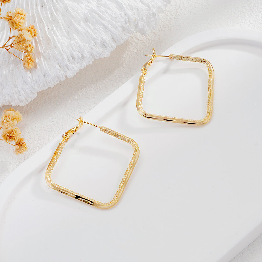 Silver Needle Minimalist Square Earrings With A Chic Cool And Understated Style